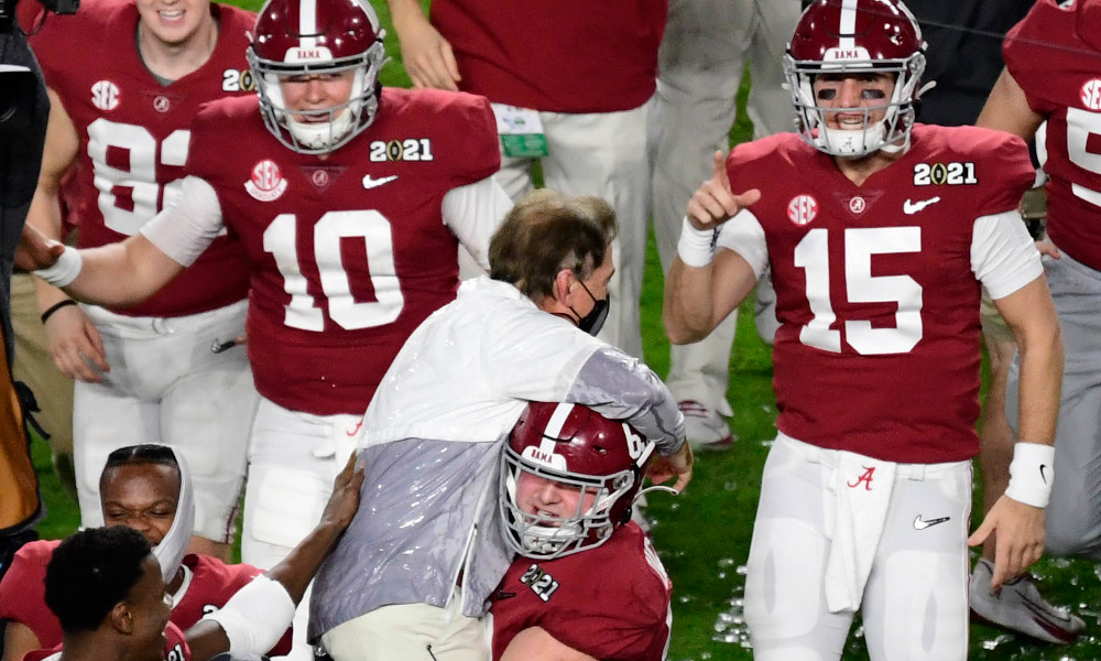 Nick Saban carried onto the field by Landon Dickerson after winning CFP title game