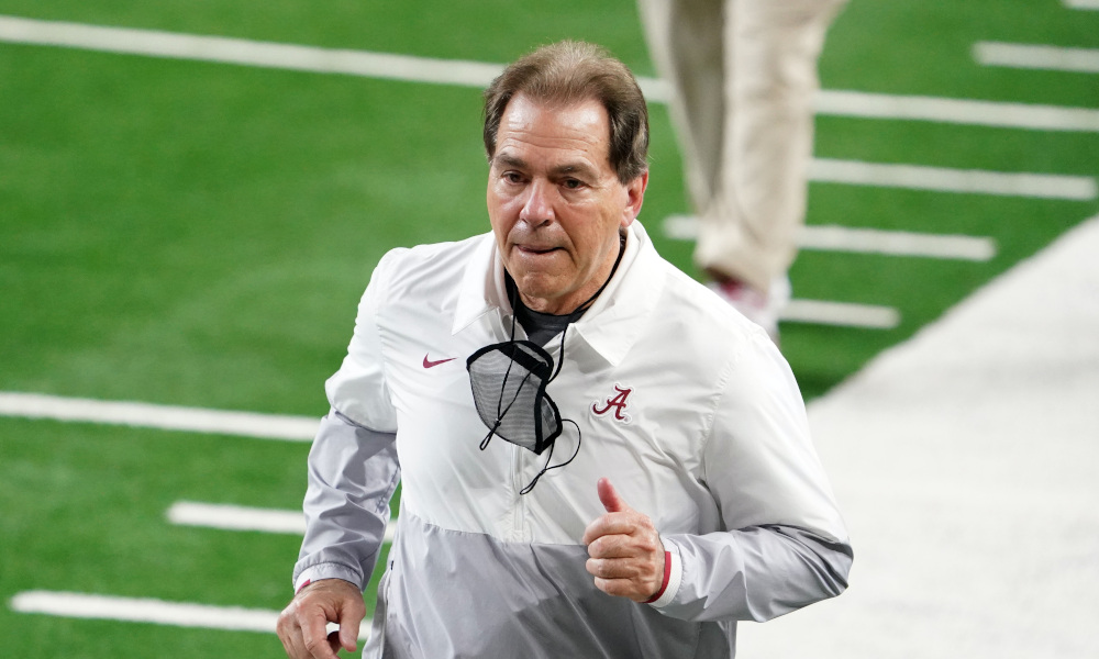 Nick Saban jogs to locker room at halftime versus Notre Dame