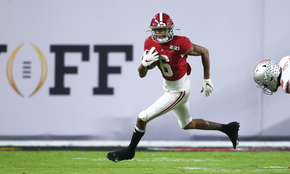 DeVonta Smith running with the ball against Ohio State in CFP title game