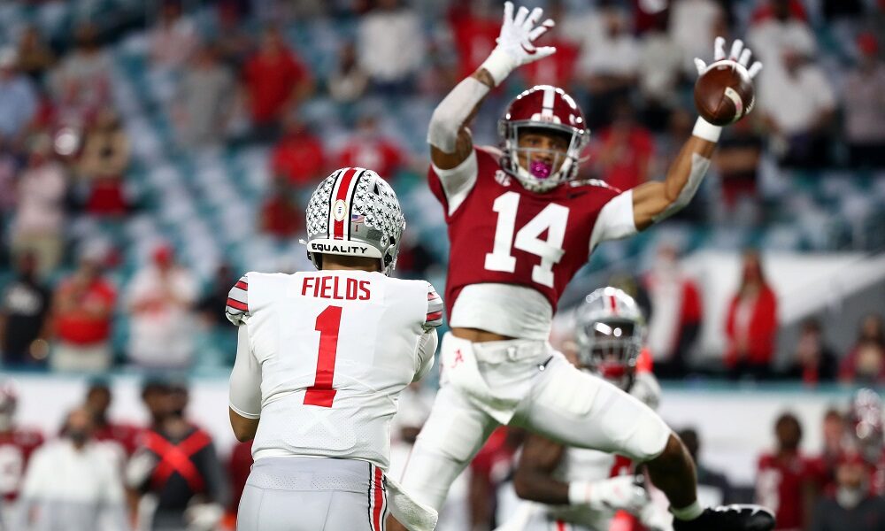 Brian Branch defends a pass versus Justin Fields and Ohio State in 2020 CFP title game