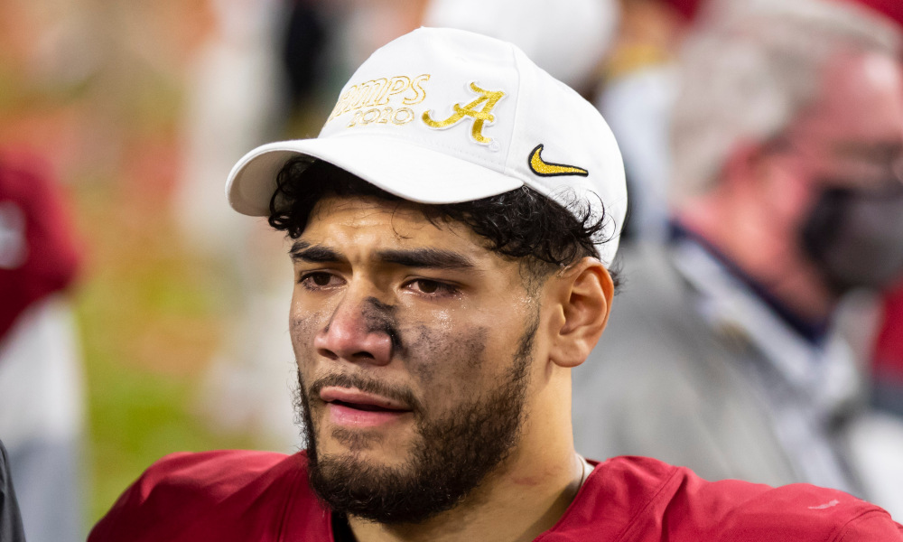 Ale Kaho wearing his CFP National Championship hat after Alabama defeated Ohio State