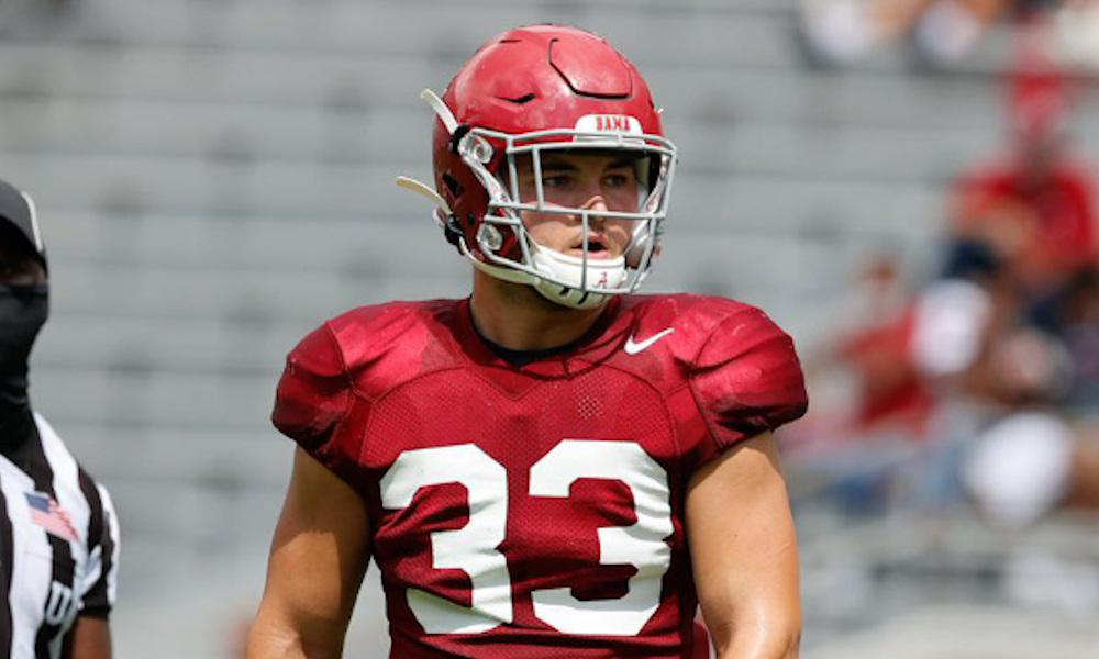 Jackson Bratton (No. 33) in warmups at LB for Alabama before a game in 2020