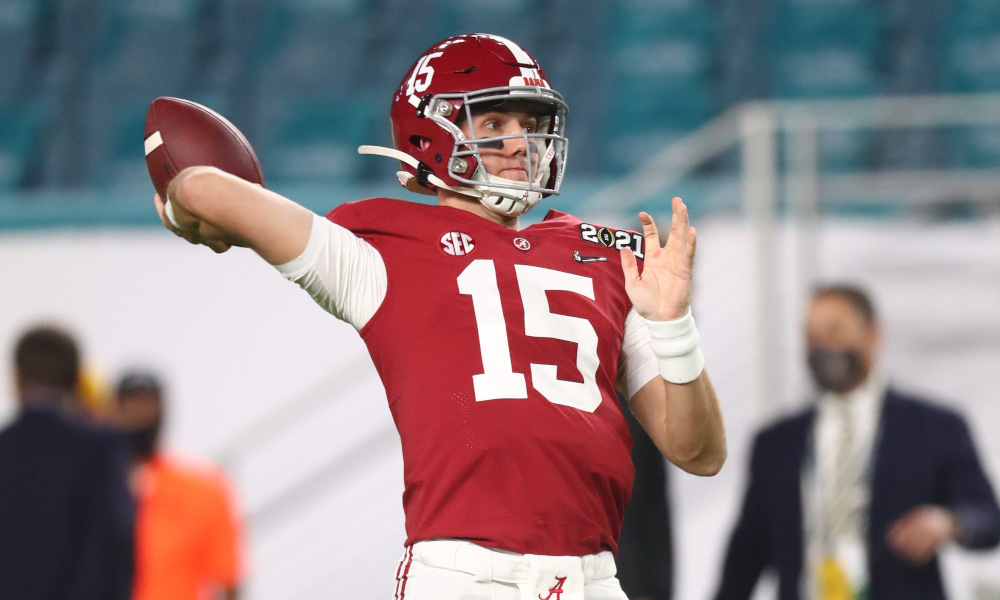 Paul Tyson throwing a pass in warmups before 2020 CFP title game versus Ohio State