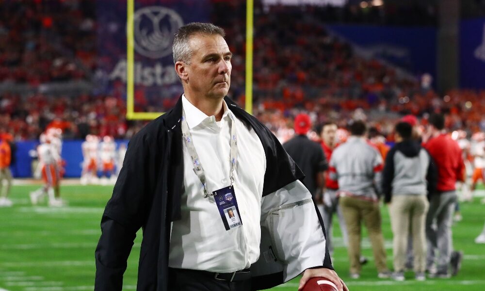 Urban Meyer walks the sidelines ahead on an Ohio State game