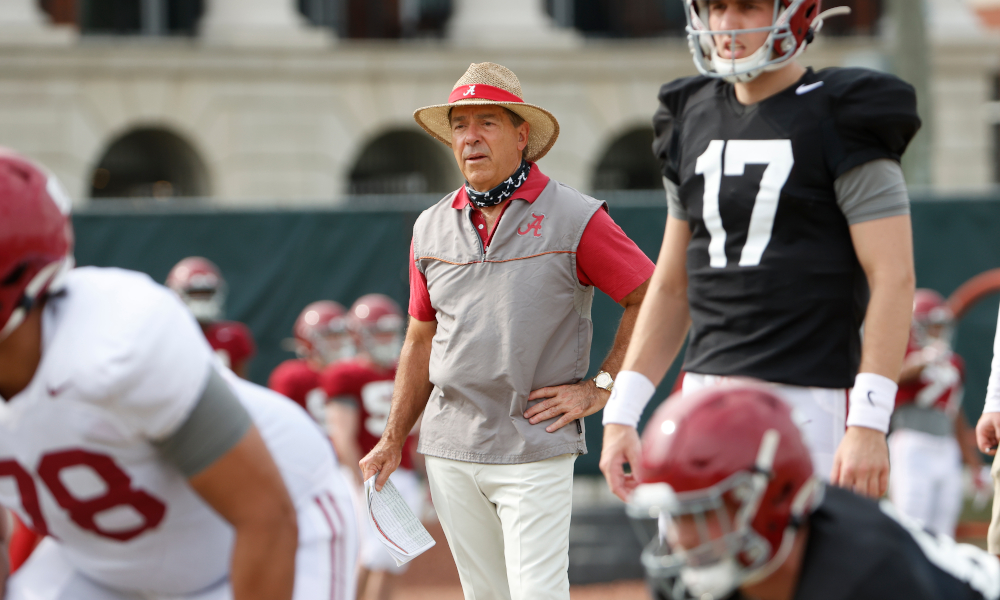 Nick Saban looks on as Alabama goes through spring practice