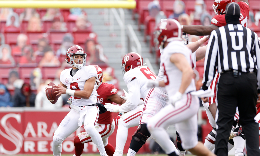 Bryce Young attempts a pass for Alabama versus Arkansas in 2020