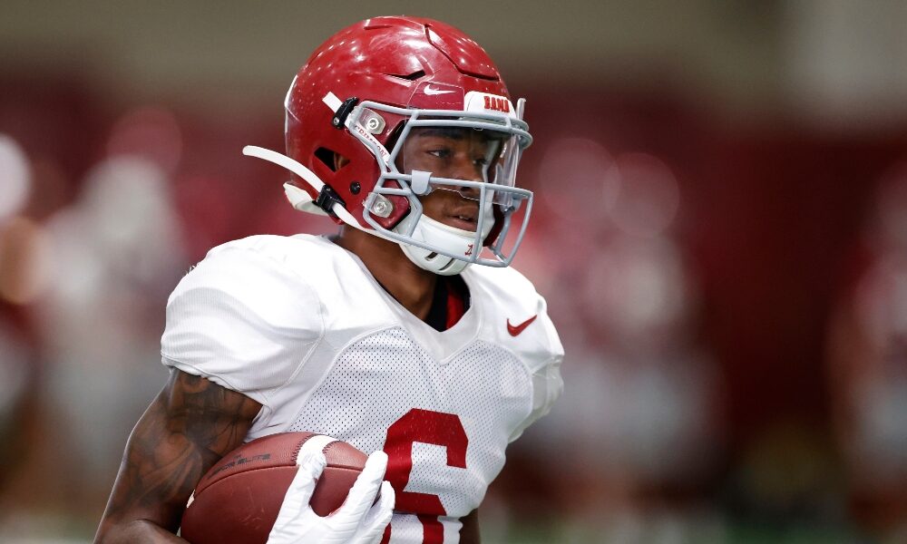 DeVonta Smith catches a pass in practice