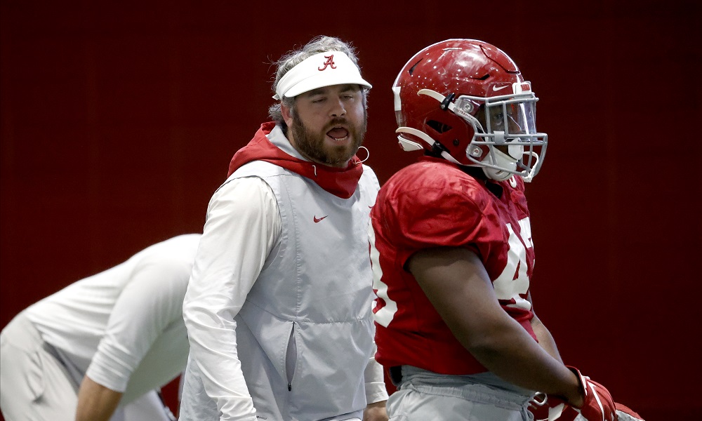 Pete Golding coaching inside linebackers in spring practice