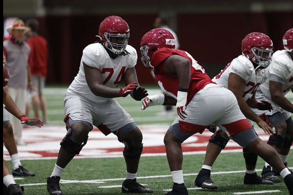 Damieon George (#74) in his stance blocking during Alabama's spring practice in 2021