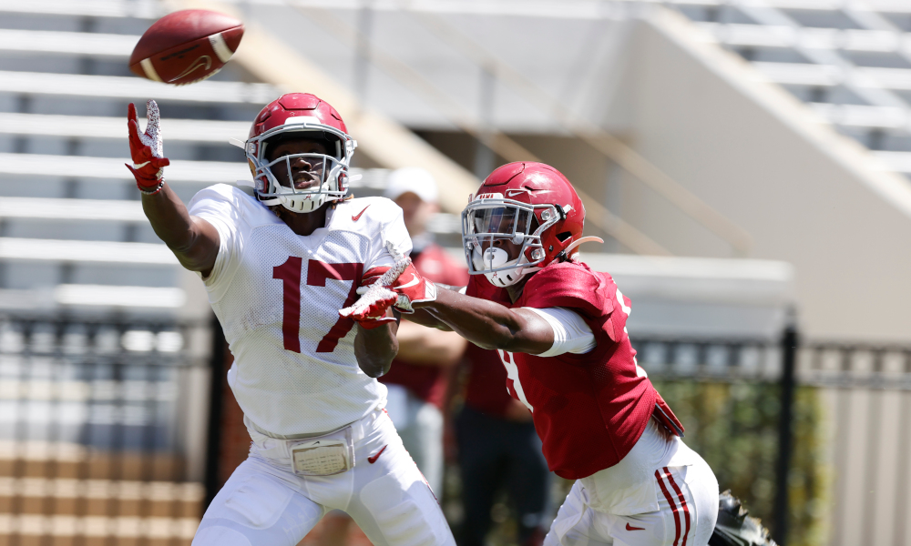 Agiye Hall (No. 17) trying to make the catch in Alabama's second scrimmage