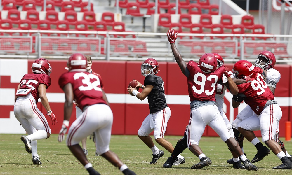 Bryce Young throws the football a