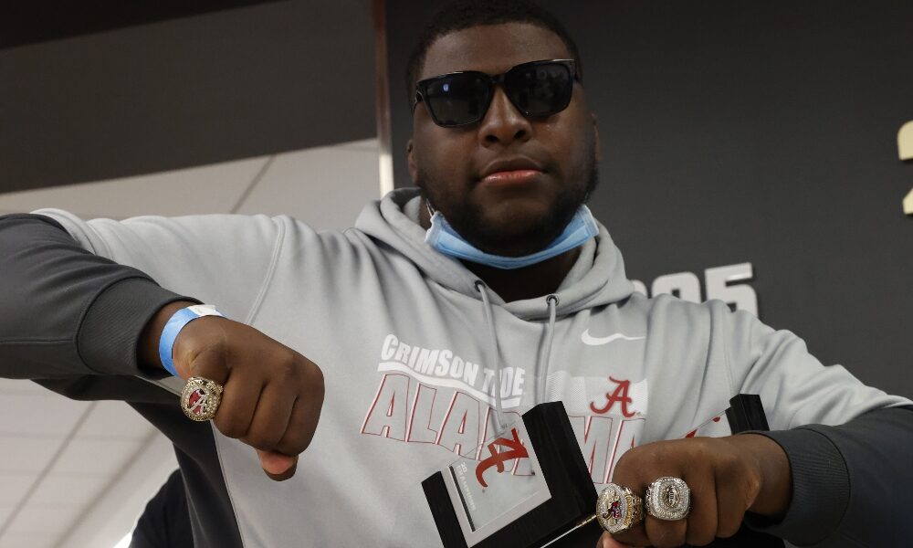 Phidarian Mathis shows off his championship rings