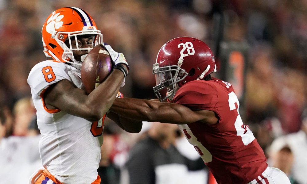 Justyn Ross (No. 8) makes a catch for Clemson versus Alabama's Josh Jobe in 2019 CFP National Championship Game
