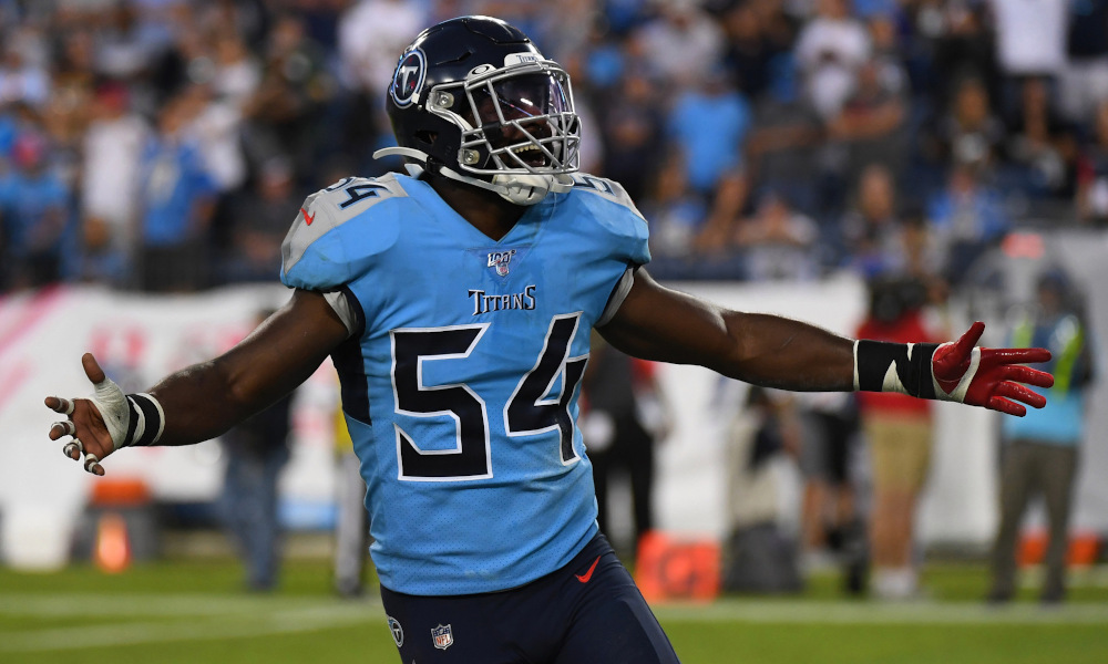 Rashaan Evans (No. 54) celebrates a defense stop in 2019 season for Titans versus L.A. Chargers