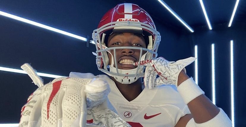 Jahlil Hurley poses for picture in Alabama uniform