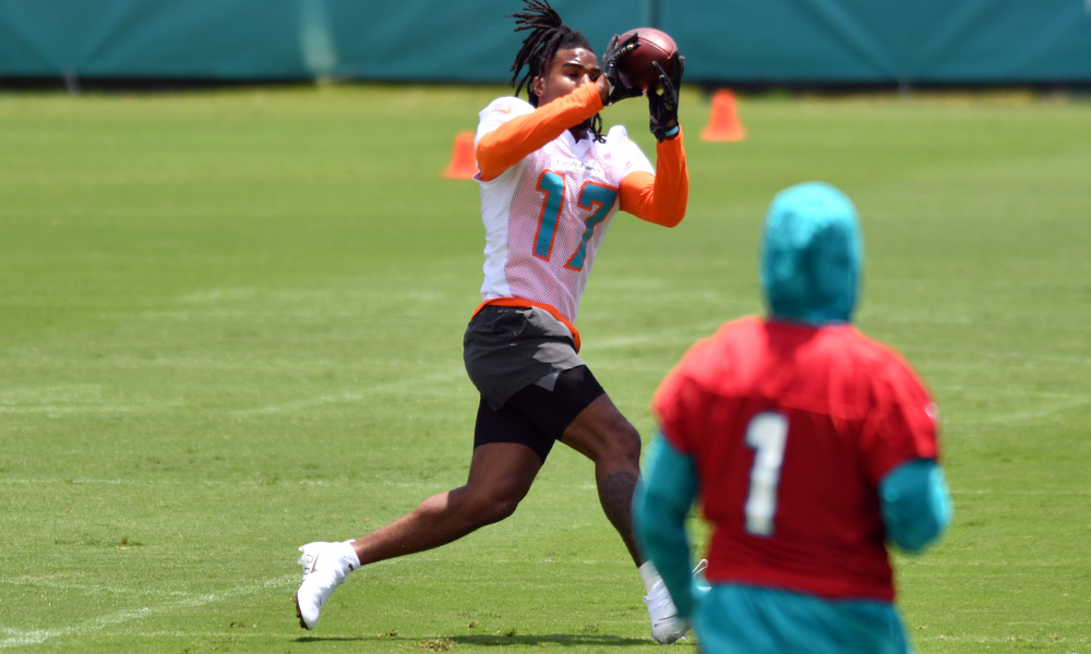 Jaylen Waddle with a catch from Tua Tagovailoa in OTAs for Dolphins