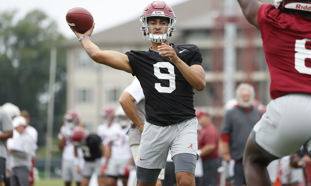 Bryce Young throwing a pass in Alabama's first practice of preseason camp