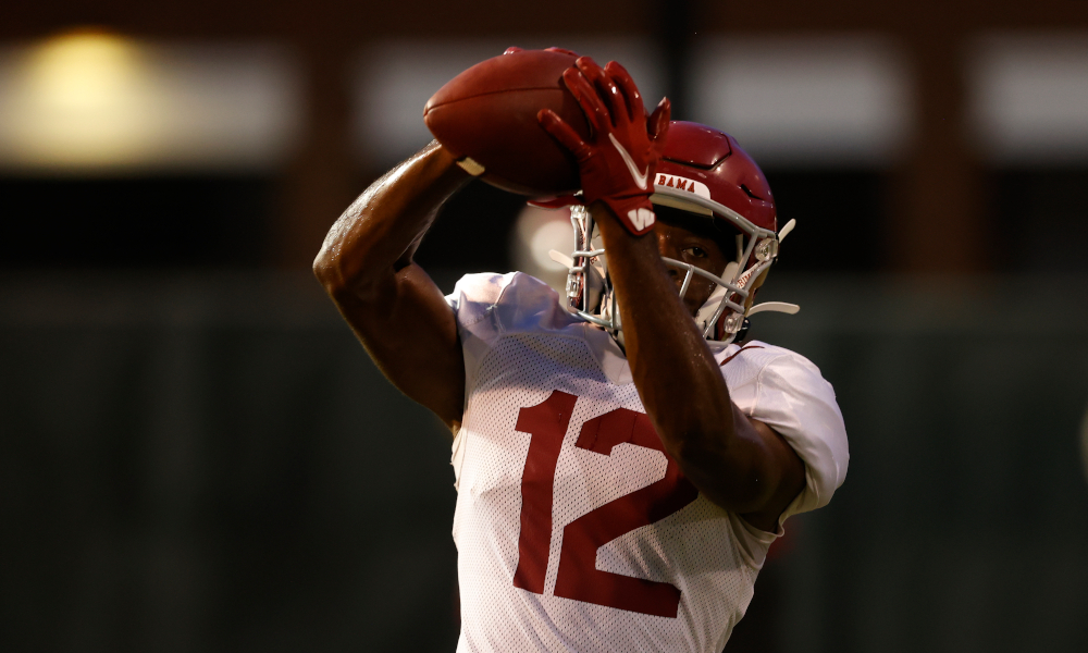 Christian Leary (#12) makes a catch for Alabama in fall camp