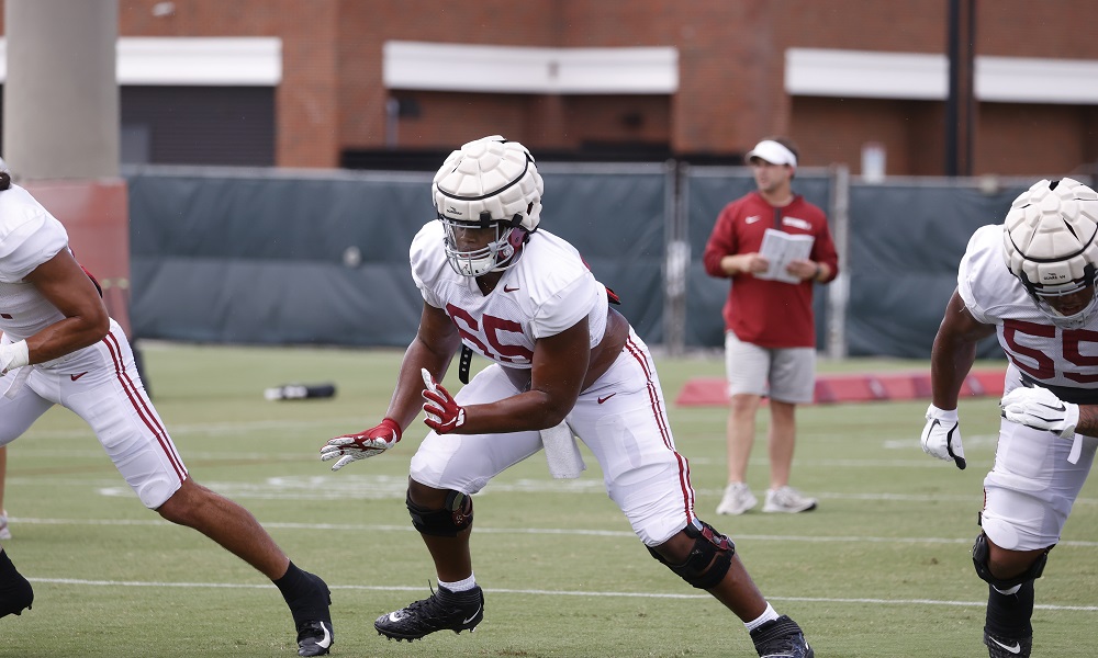 JC Latham (#65) going through drills at Alabama practice