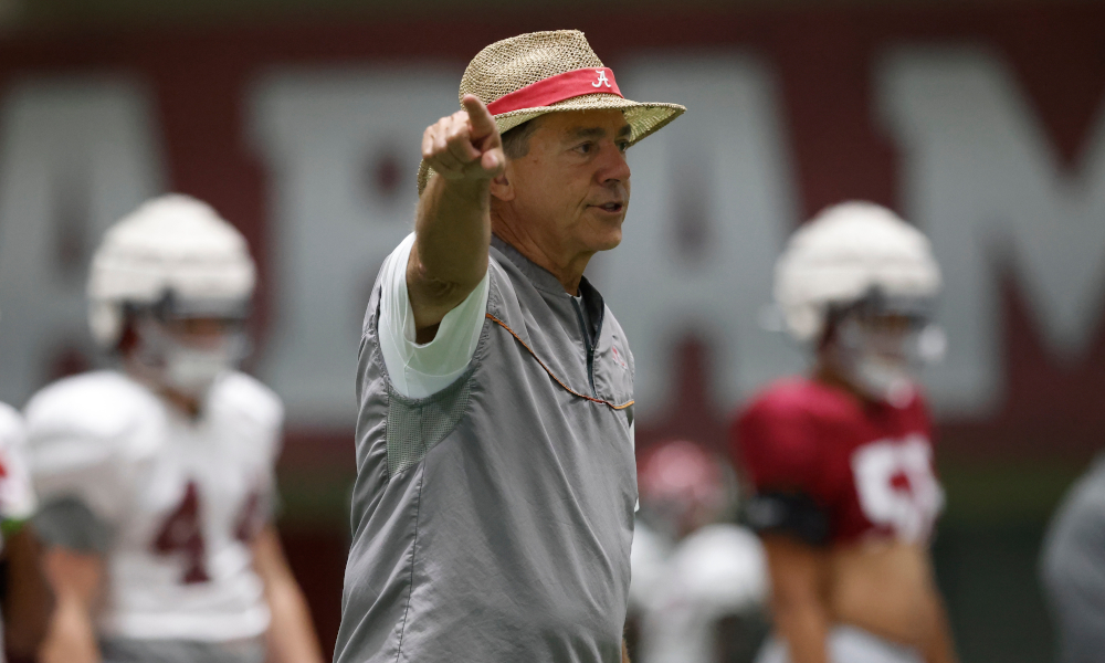 Nick Saban directing players at Alabama fall camp practice