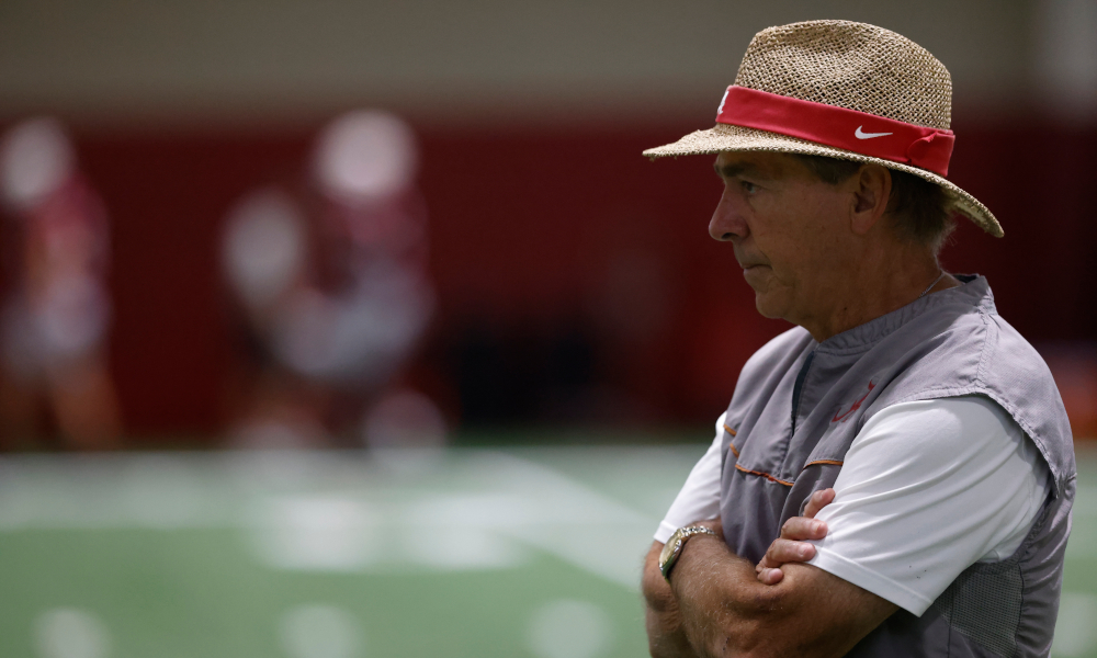 Nick Saban looks on at Alabama's indoor practice during fall camp