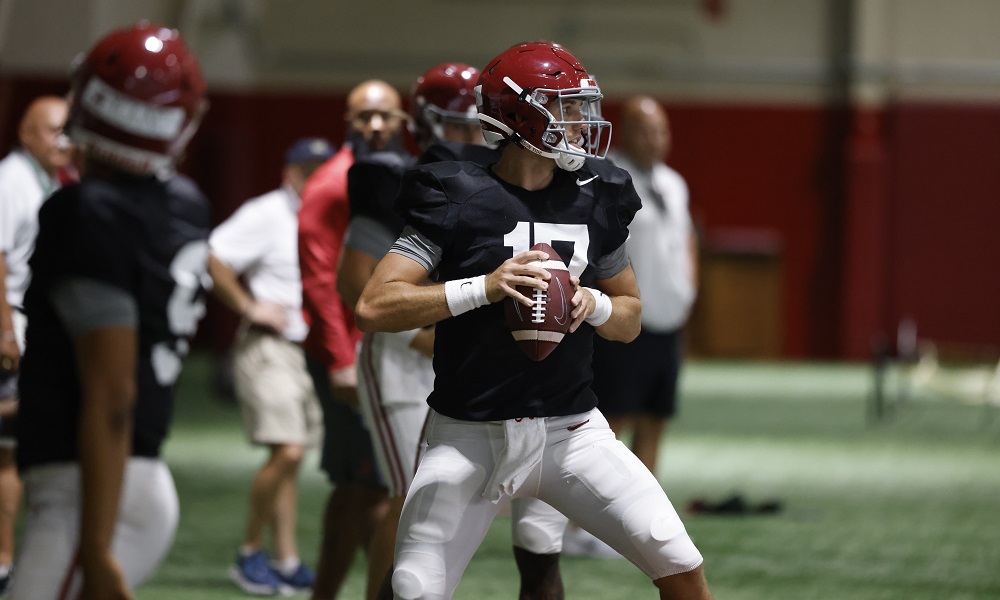 Paul Tyson (No. 17) drops back in pocket during Alabama practice