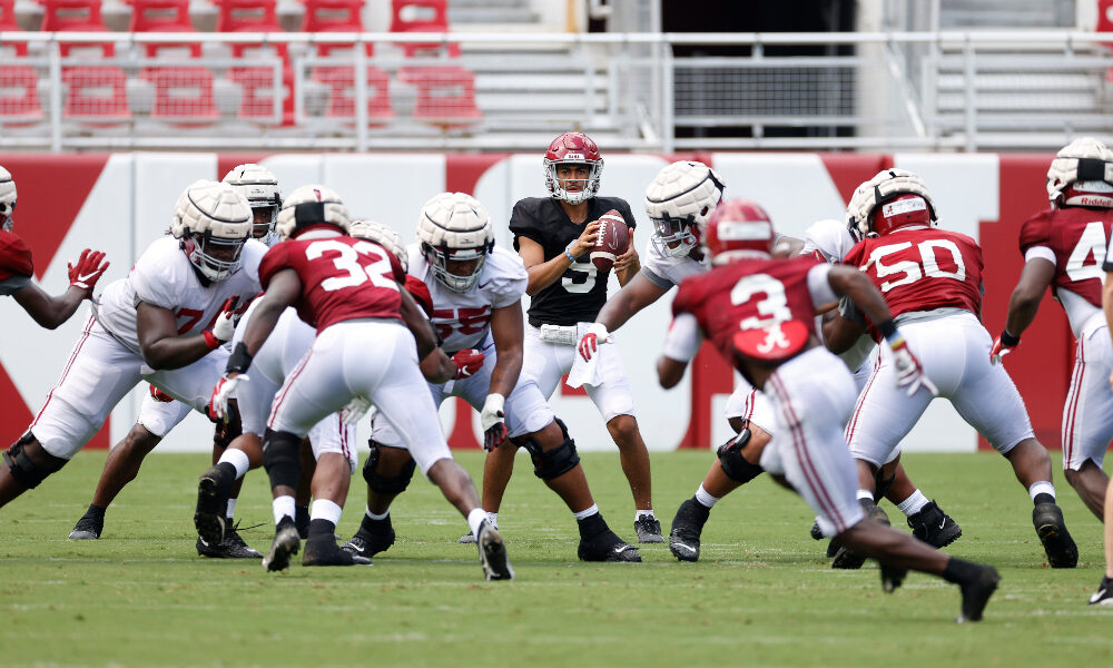 Bryce Young drops back to pass during Alabama's scrimmage