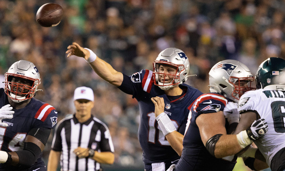 Mac Jones throws a pass for Patriots in preseason game versus Eagles