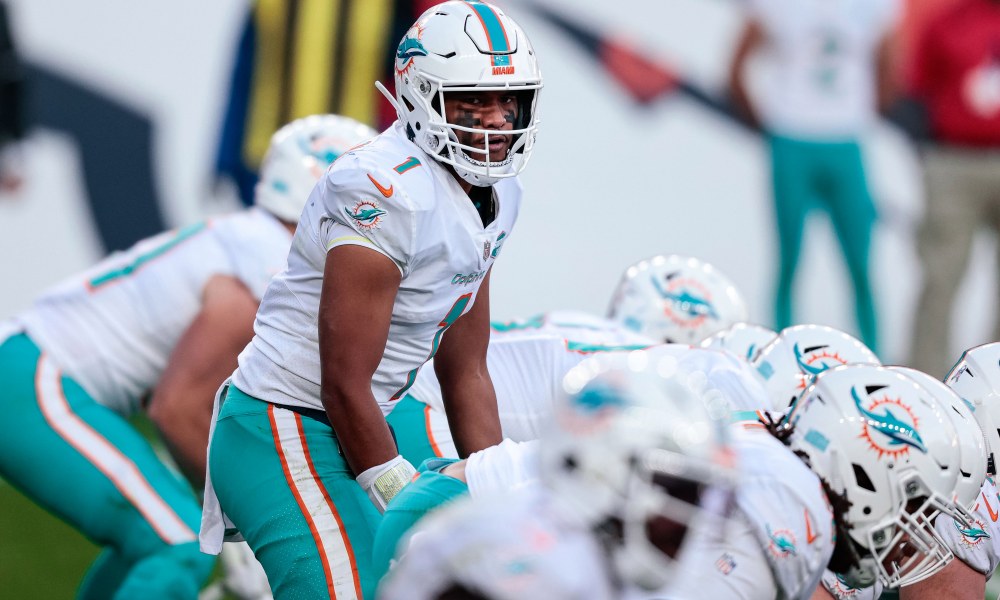 Tua Tagovailoa at line of scrimmage for Dolphins in 2020 game versus Broncos