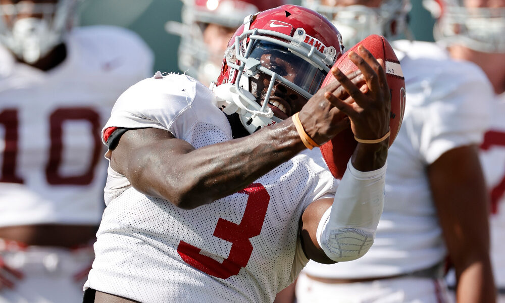 Xavier Williams catches a pass at practice