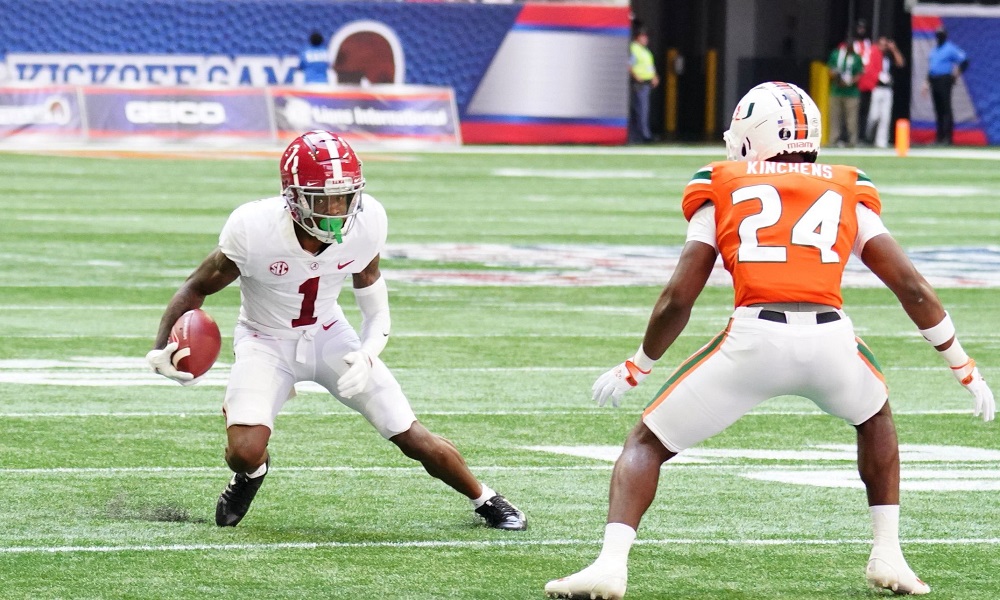 Alabama wide receiver, Jameson Williams runs with the football against Miami