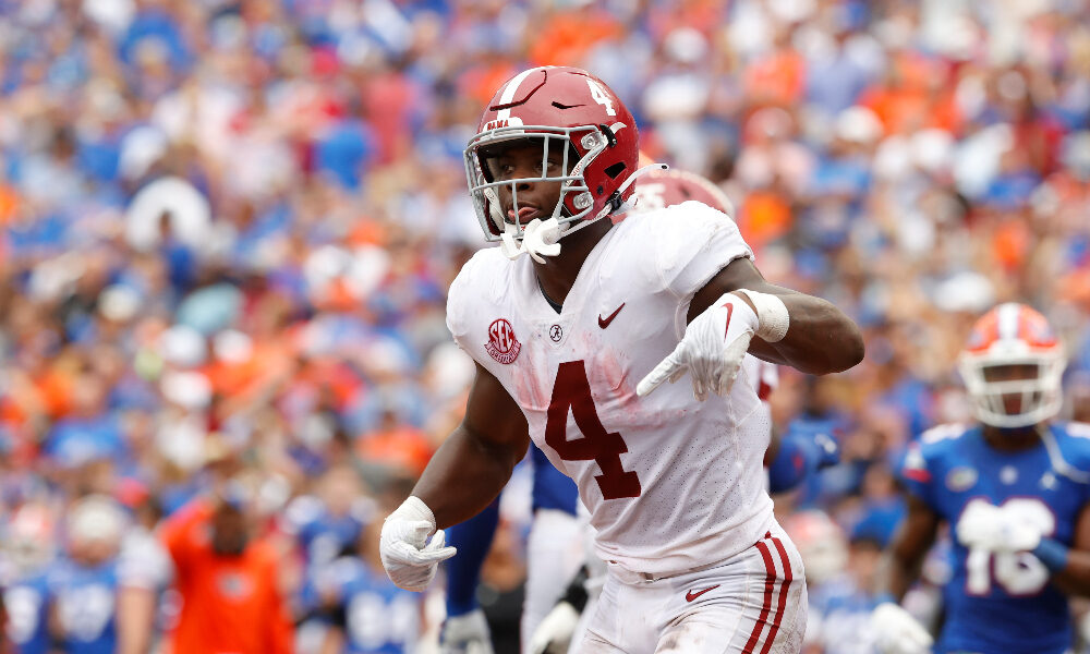 Brian Robinson celebrates a gain against Florida