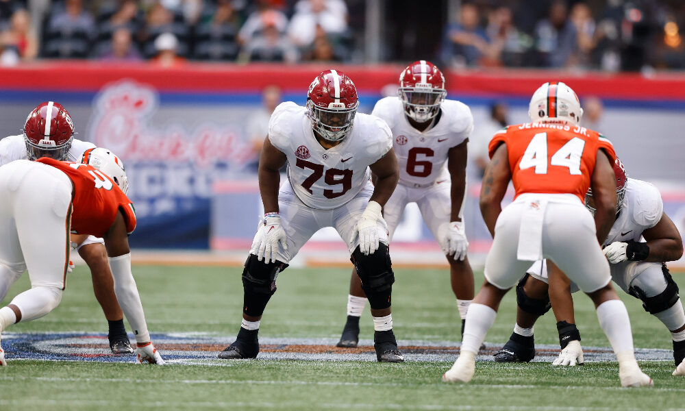 Chris Owens gets in his stance against Miami