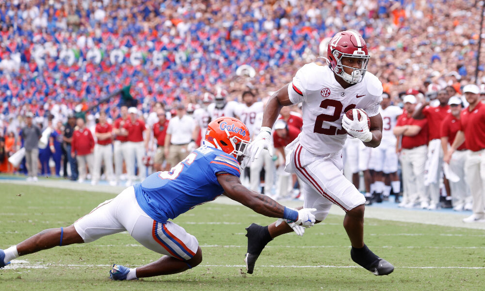 Jase McClellan breaks a tackle against Florida