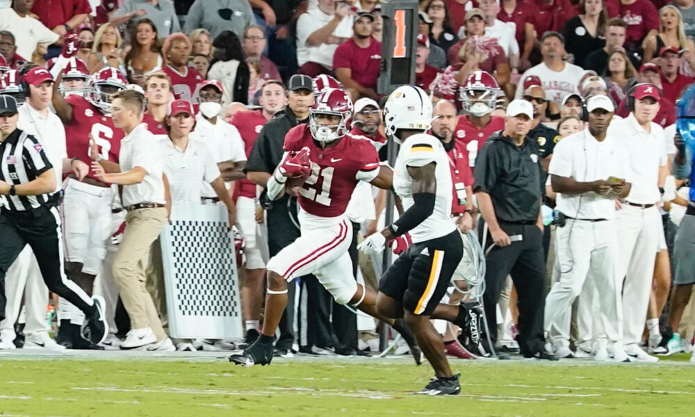 Jase McClellan carries the football against Southern Miss