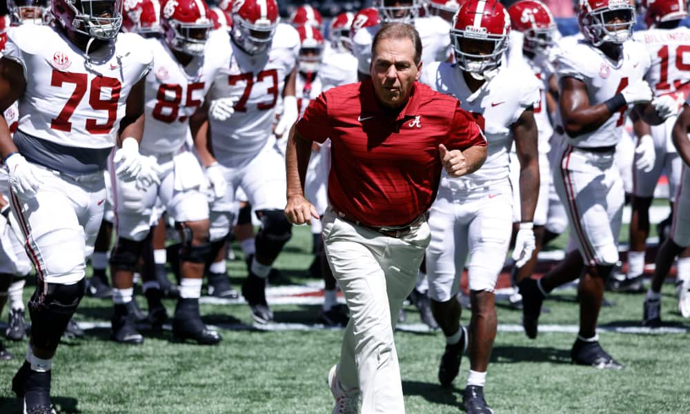 Nick Saban leading Alabama onto the field versus Miami at Mercedes-Benz Stadium