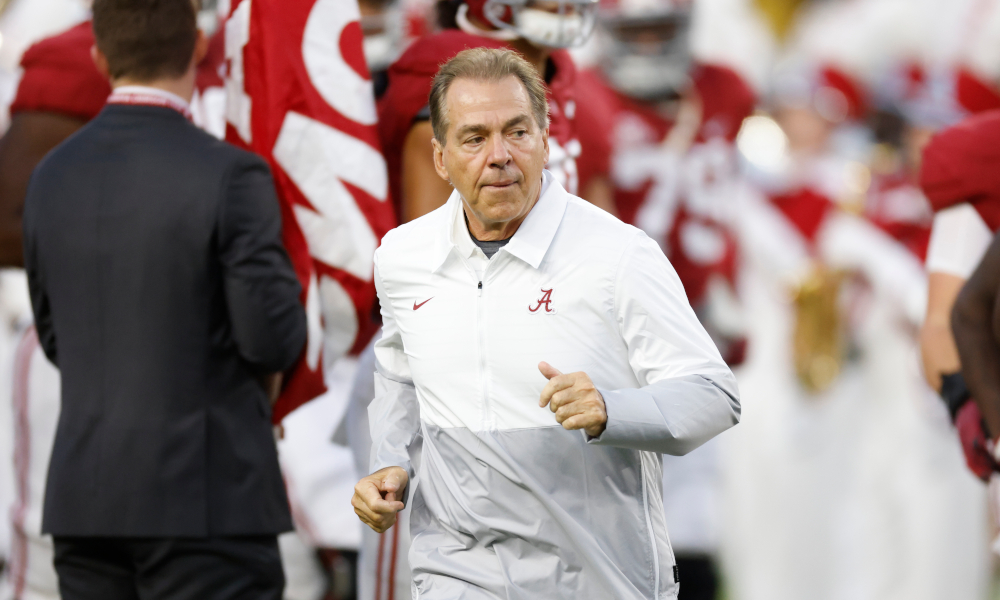 Nick Saban runs on the field at Bryant-Denny Stadium for Alabama versus Southern Mississippi game