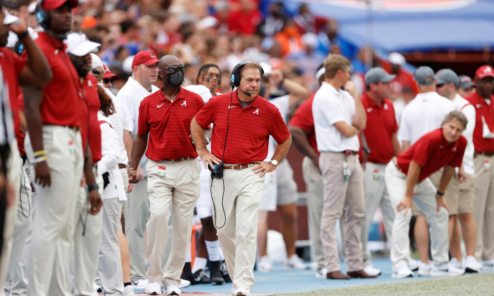 Nick Saban walking the Alabama sideline versus Florida