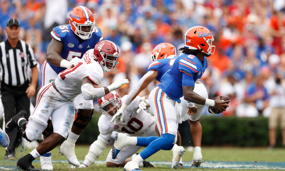 Will Anderson (#31) trying to pressure Emory Jones (#5) of Florida