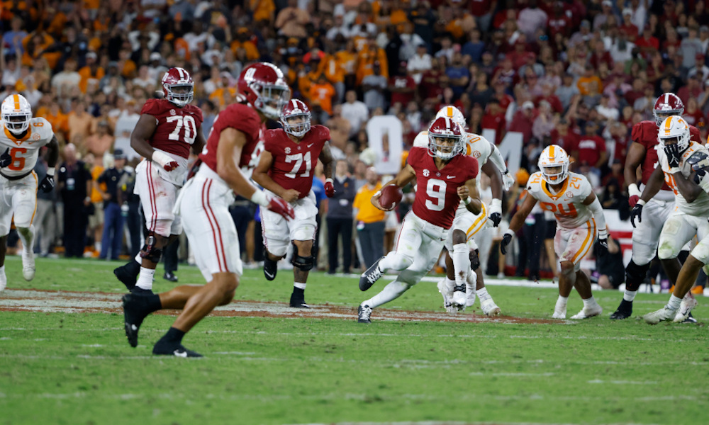 Bryce Young (#9) scrambling versus Tennessee during Alabama's homecoming game