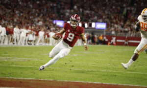 Bryce Young scrambles to the endzone against Tennessee