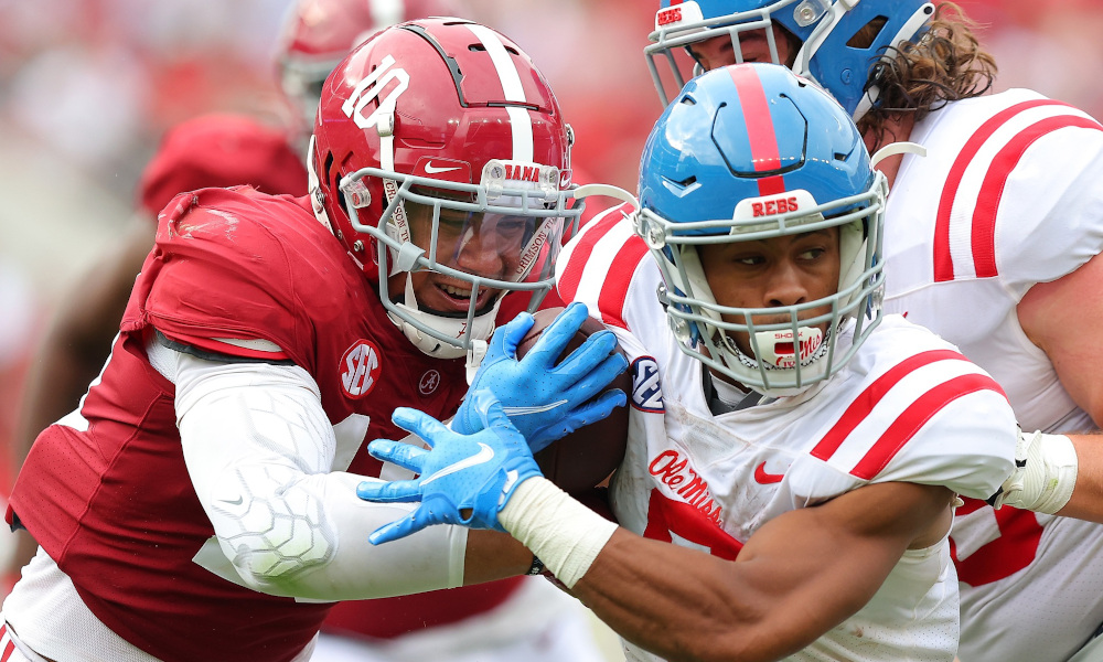 Henry To'oto'o (#10) makes a tackle for Alabama versus Ole Miss