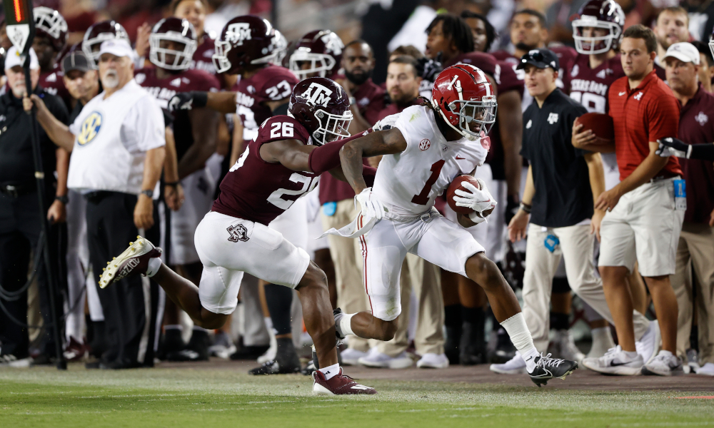 Jameson Williams (#1) runs with the ball down the sideline for Alabama versus Texas A&M