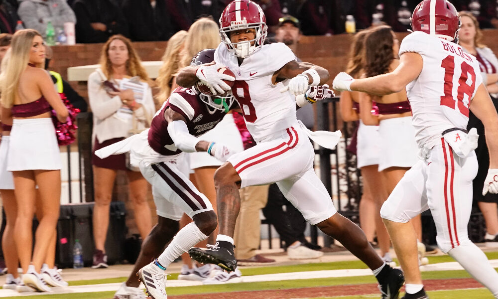 John Metchie evades tacklers on a touchdown reception