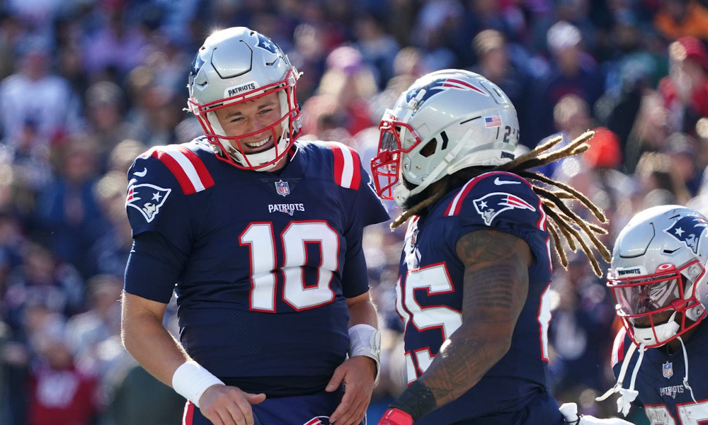 Mac Jones (#10) celebrates touchdown passes for Patriots versus Jets