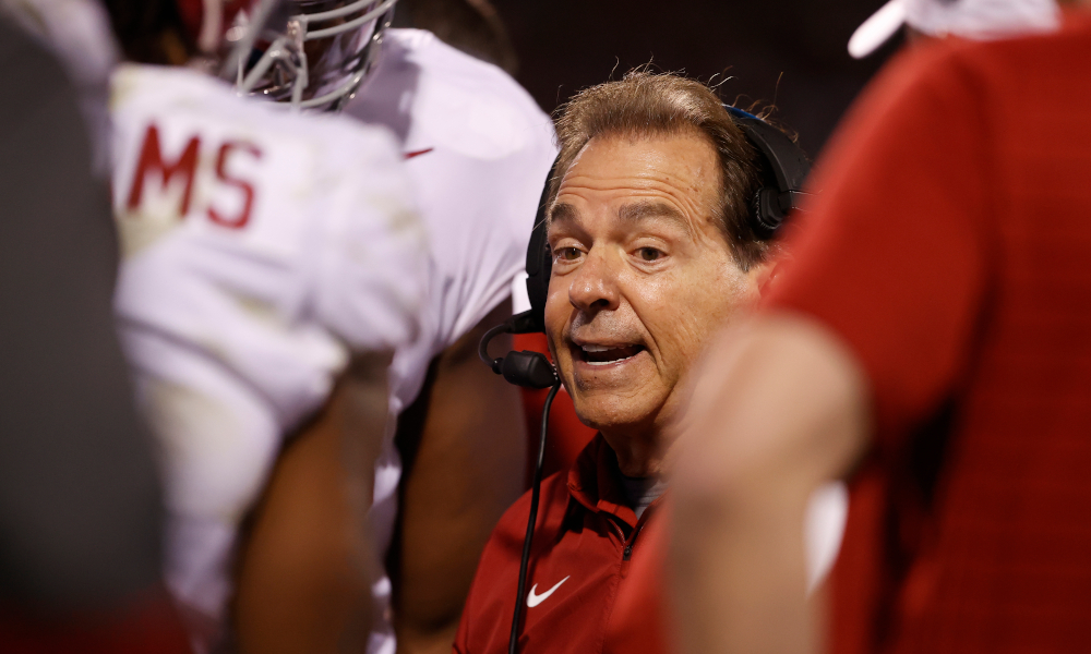 Nick Saban in the Alabama huddle talking during timeout versus MSU