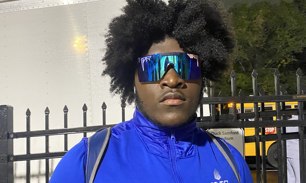 Tyler Booker pose for picture after IMG Academy game