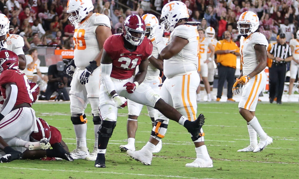 Will Anderson celebrates a tackle against Tennessee