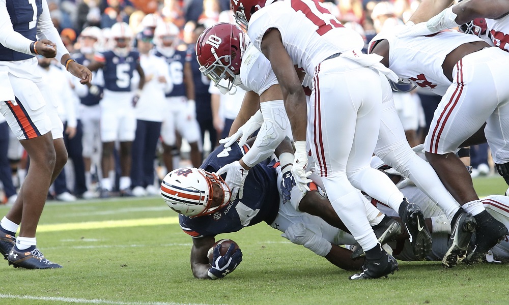 Auburn Tank Bigsby get tackled by Alabama against Auburn