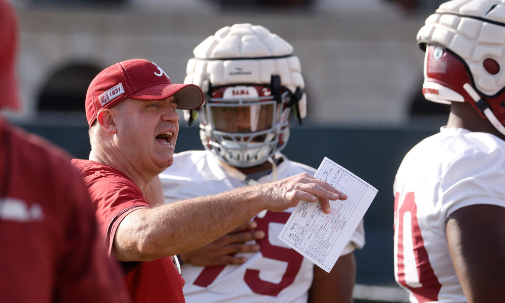 Bill O'Brien gives instructions at practice